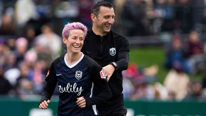 Vlatko Andonovski and Megan Rapinoe of Reign FC
